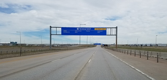 Empty access road to airport on a fine dau for flying